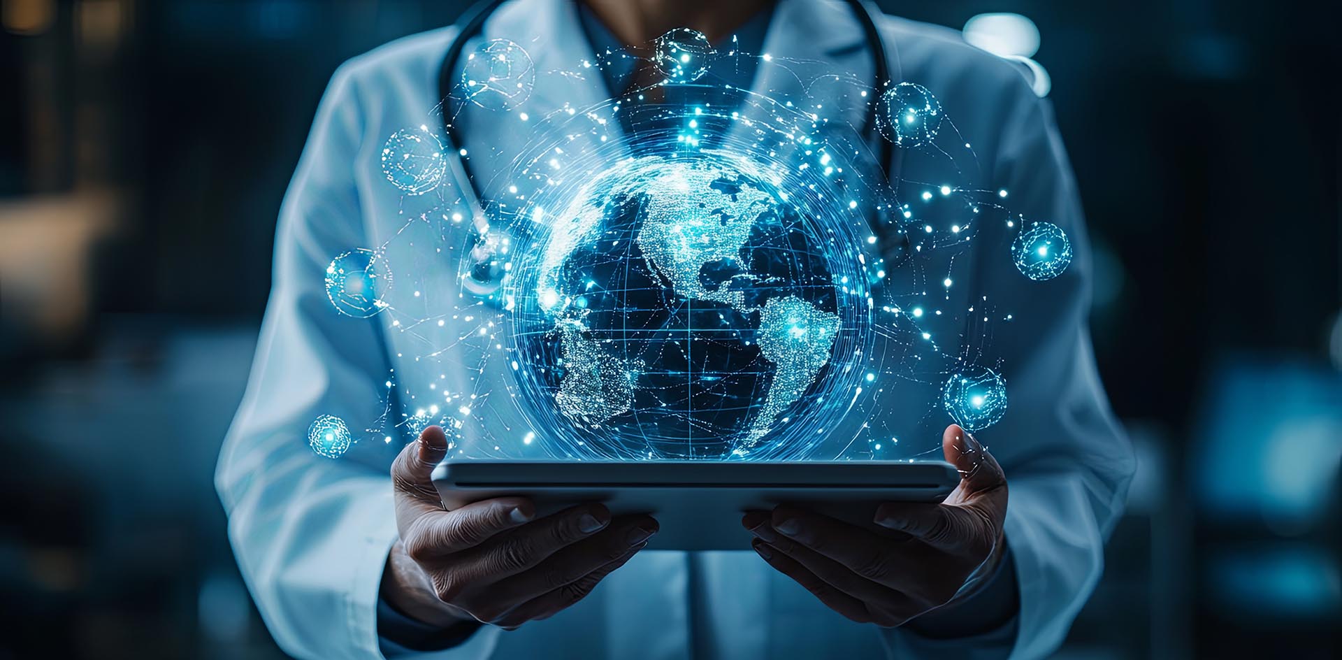 doctor holding laptop with globe of the world above